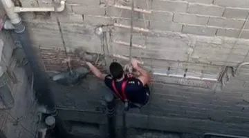 نجاح إنقاذ قطة محتجزة في منور عقار بـ النزهة.. فيديو وصور توثق اللحظة